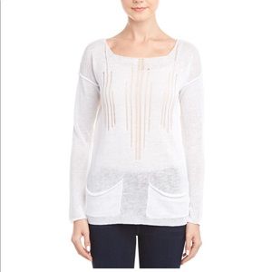 A NWT Lisa Todd sweater. White.Size Small.